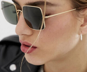 Model wearing Maui Jim sunglasses