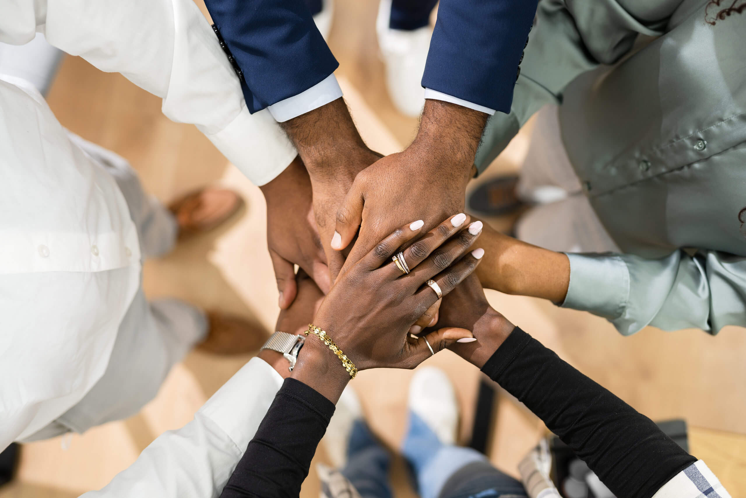 African Business Team Hands. Community Spirit Concept