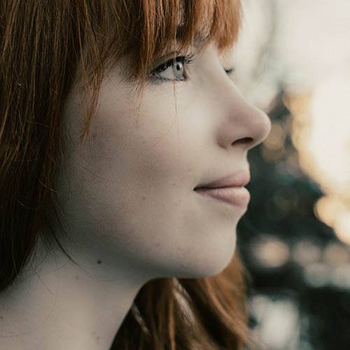 Lady with red hair, Eye Doctor in Orlando & Lake Mary, FL