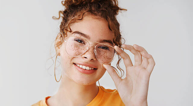 Eye Doctor Showing Eyeglasses