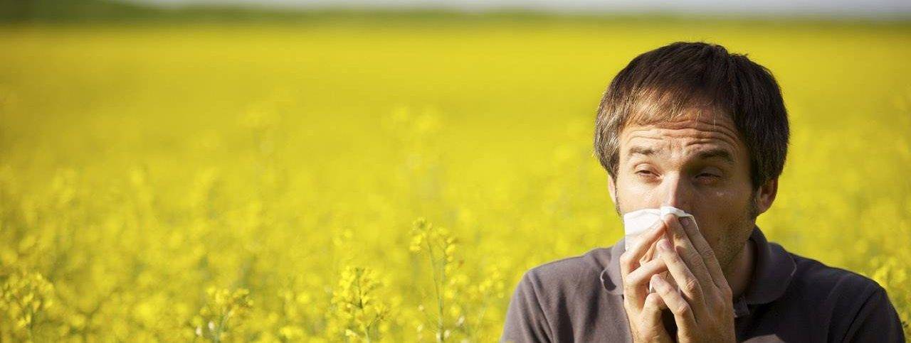 Man suffering from eye allergies
