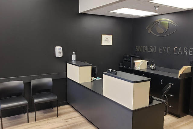 Eye Doctor Showing Eyeglasses