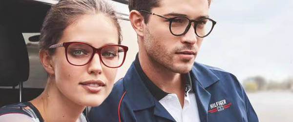 young couple wearing designer frames in Athens, GA
