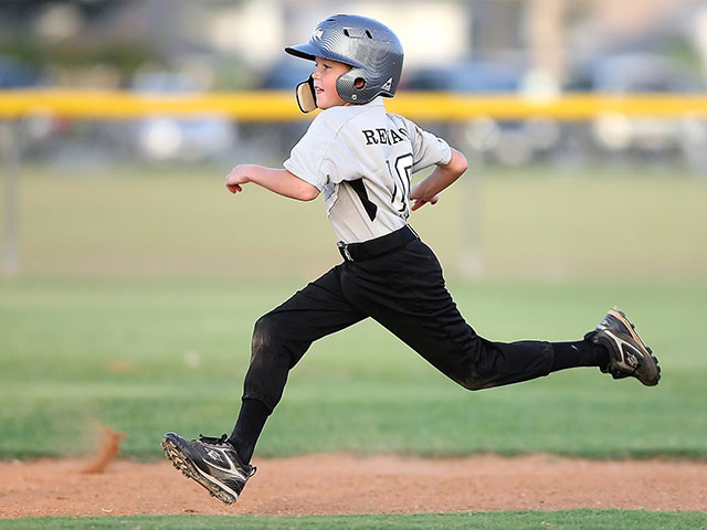 kid playing baseball
