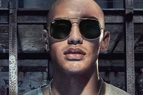 Model wearing Ray Ban sunglasses