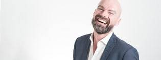Man Wearing Suit Laughing