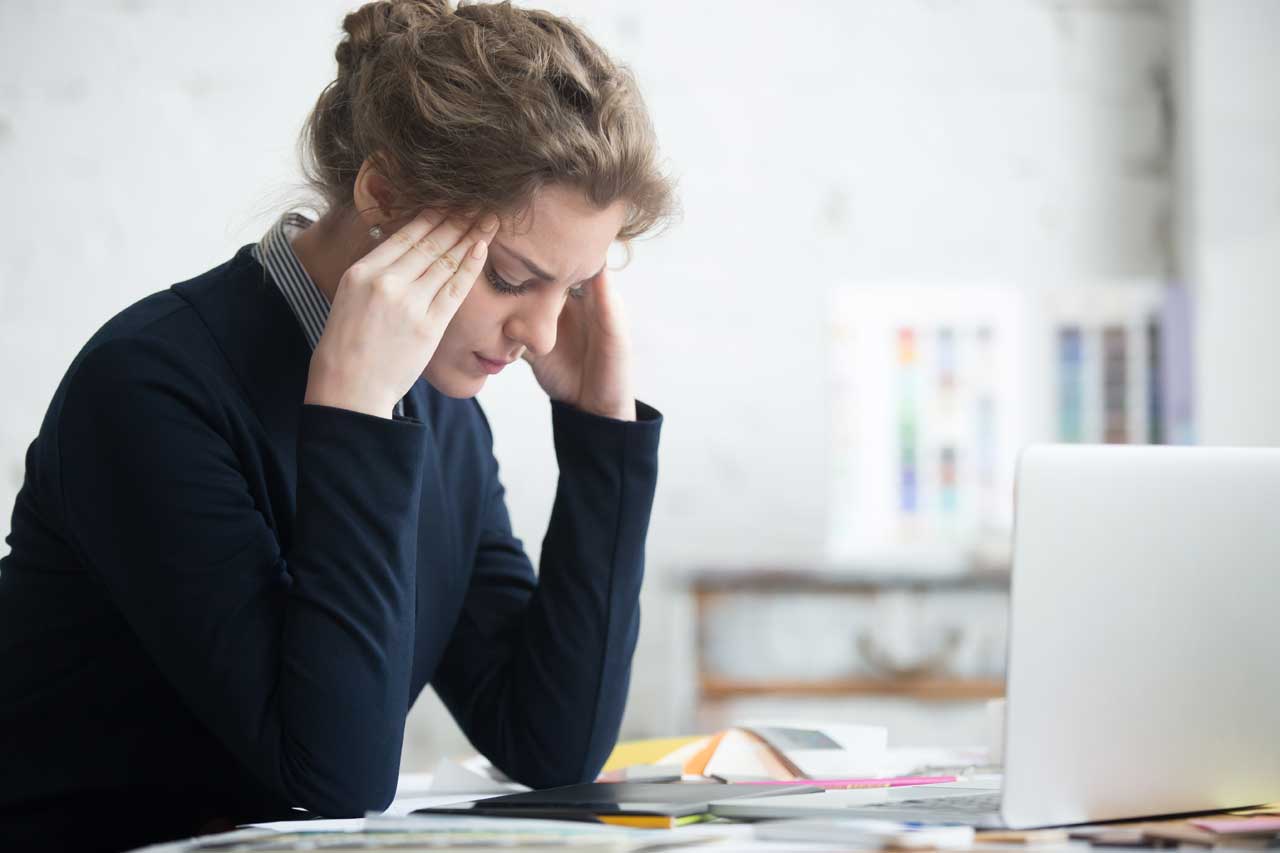 woman with headache and neck pain, digital strain in Clive, Iowa