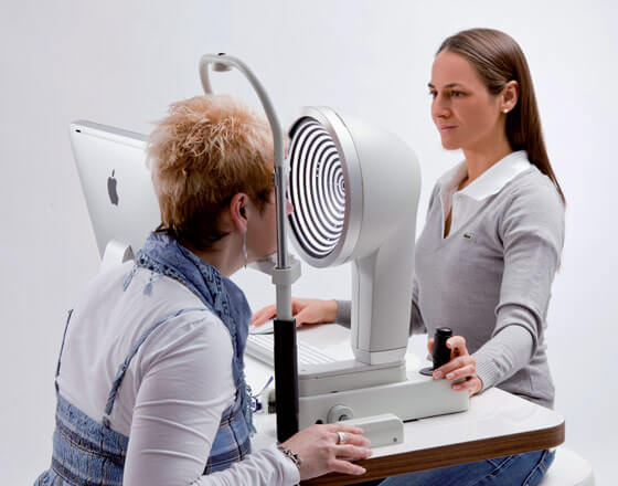 eye exam, female with closed eyes