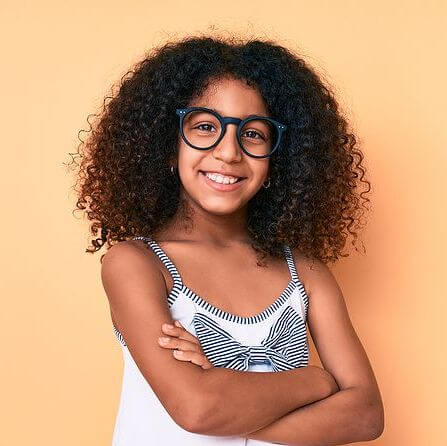 African american child with curly hair wearing casual clothes an