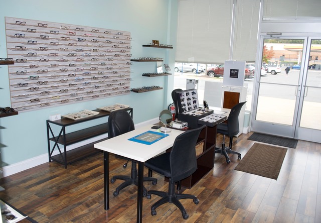 Eye Doctor Showing Eyeglasses