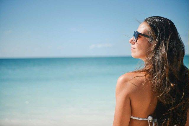 optometrist, woman wearing prescription sunglasses in New Holland, Pennsylvania