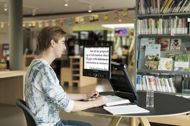 optelec clearview go studying in the library lr