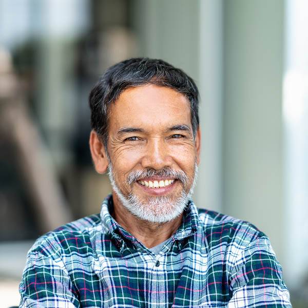 Portrait Of Happy Mature Man With White, Grey Stylish Short Bear