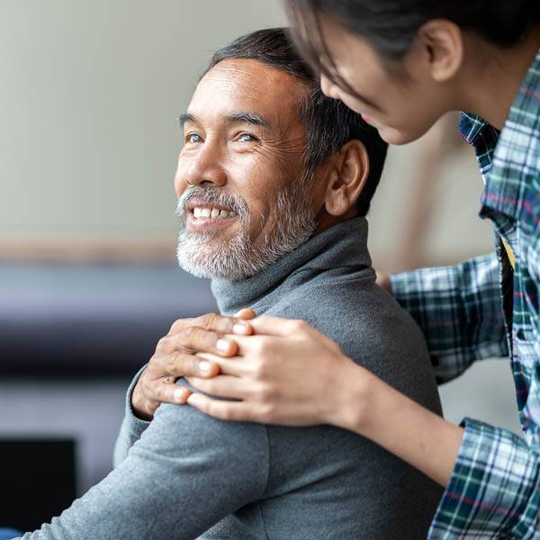 Smiling Happy Older Asian Father With Stylish Short Beard Touchi