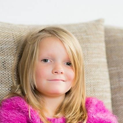little girl with myopia