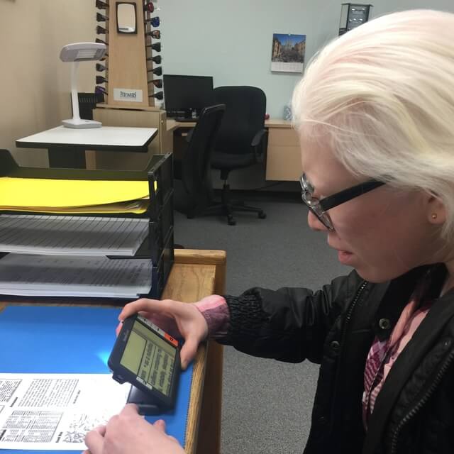albinism patient using low vision devices