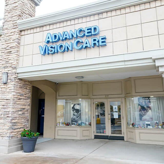 Eye Doctor Showing Eyeglasses
