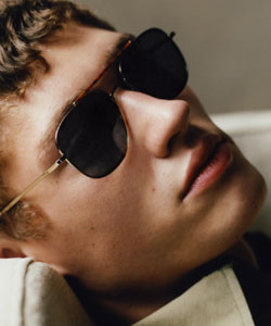 Model wearing Calvin Klein sunglasses