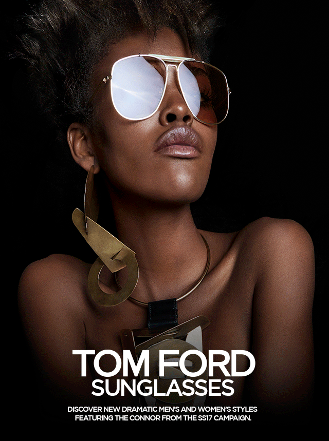 Woman wearing round designer sunglasses