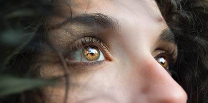 Woman's eye, ad for Eye Care Emergencies