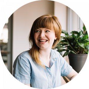 smile-woman-plant-e1541928777992