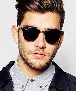 Model wearing Ray-Ban sunglasses