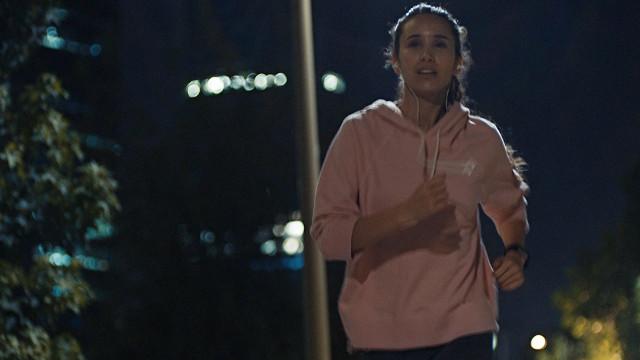 Eye care, girl is jogging at night with contact lens in Longview, TX