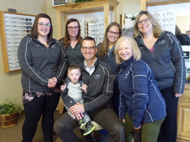 Staff with Dr Porter and his son Kallan