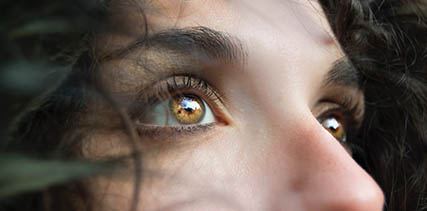 Woman's eye, ad for Eye Care Emergencies