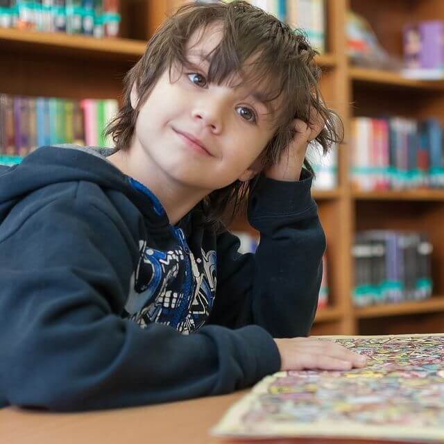 child library smiling reading 640px