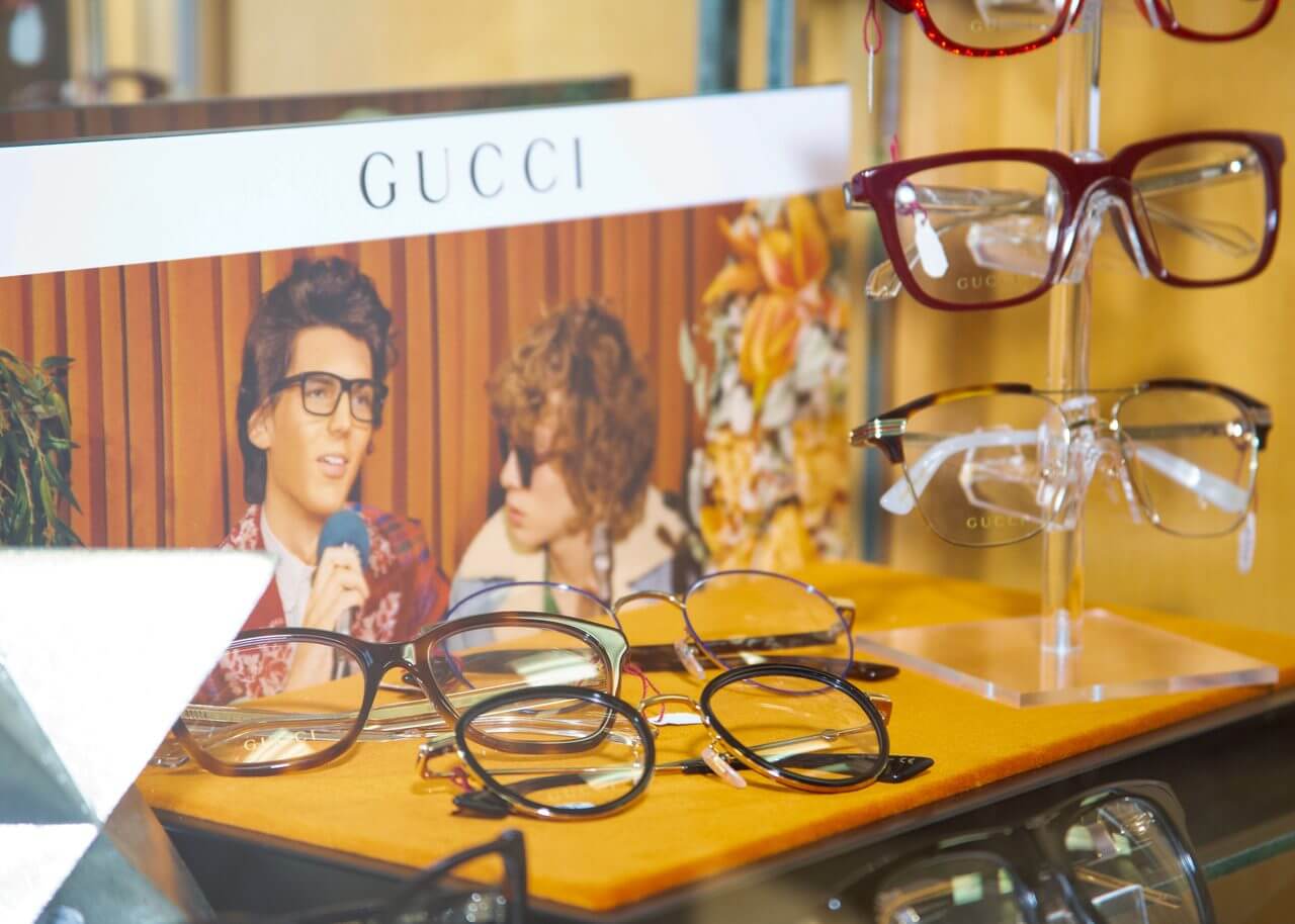 eyeglasses on top of eye chart