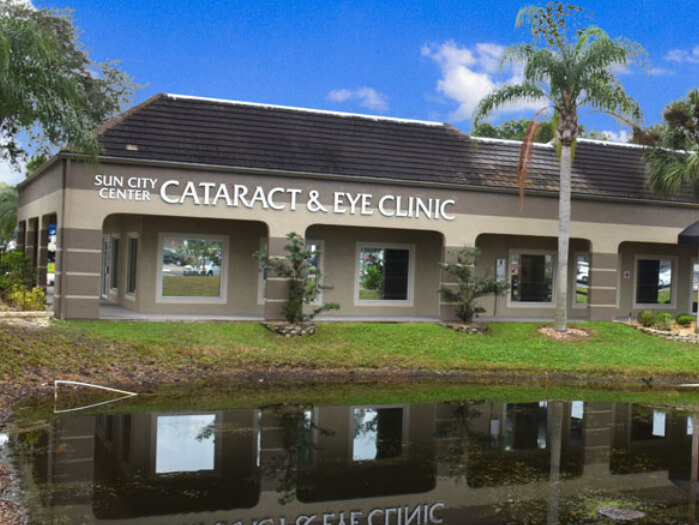 optician holding eyeglasses