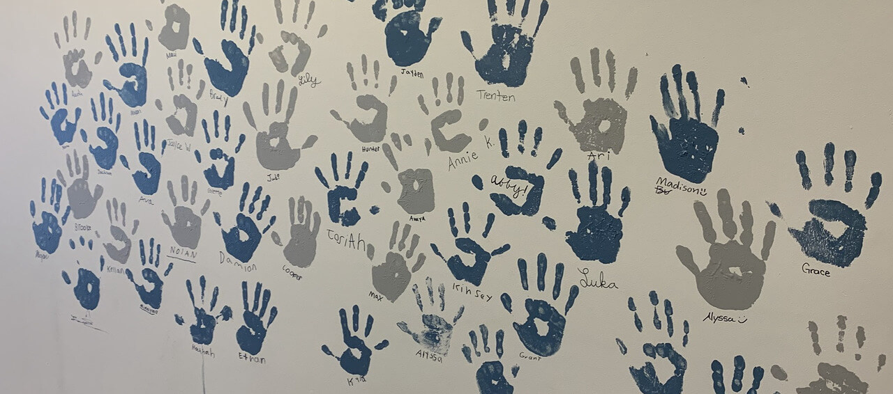wall of graduates
