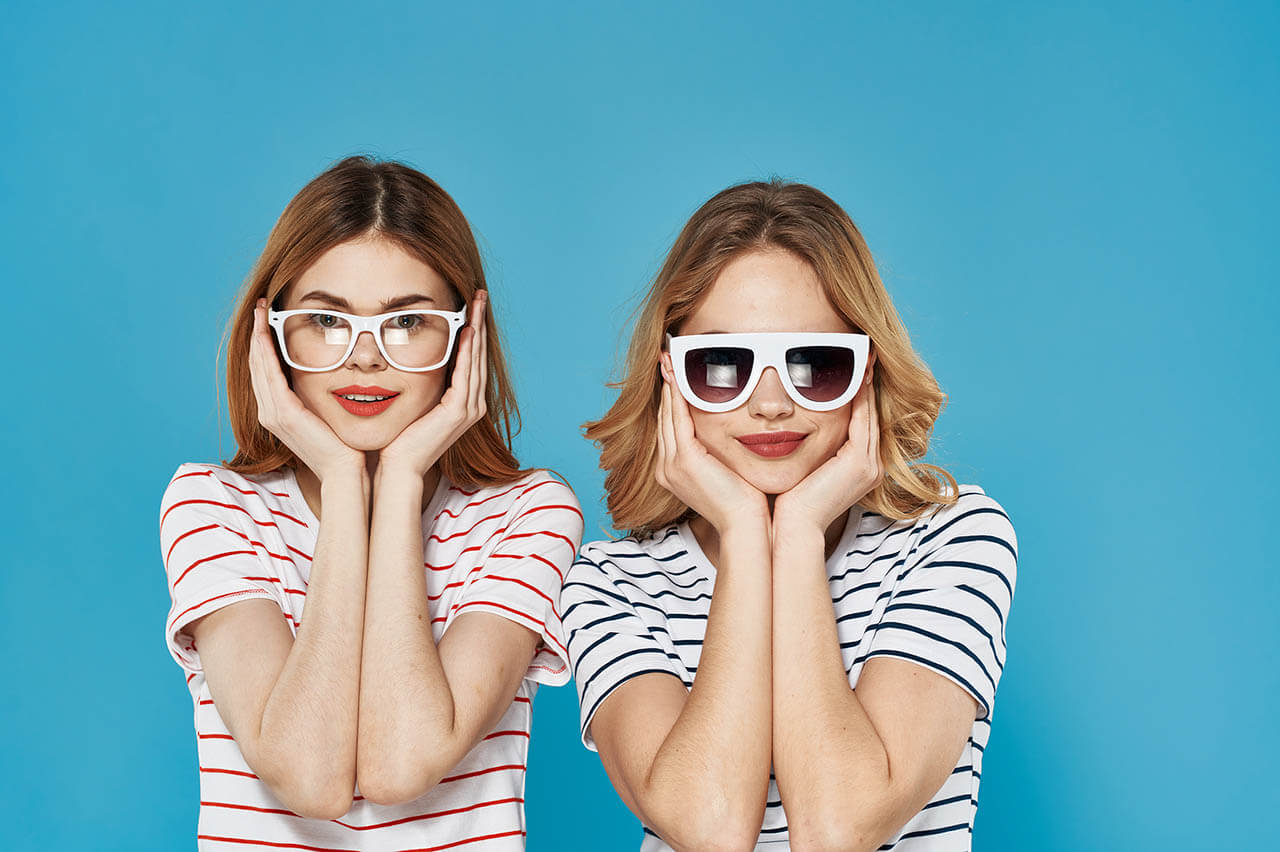 Two Funny Sisters In Striped T shirts With Glasses Fashion Lifes
