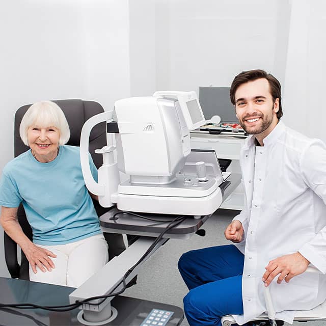 Smiling-Optometrist-low-vision-eye-exam-640