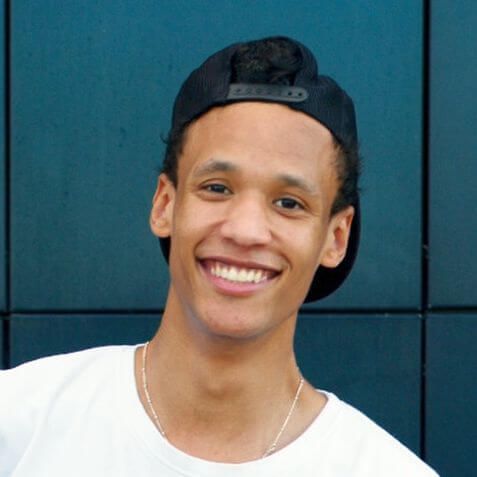 ethnic teen boy smiling contacts ortho k