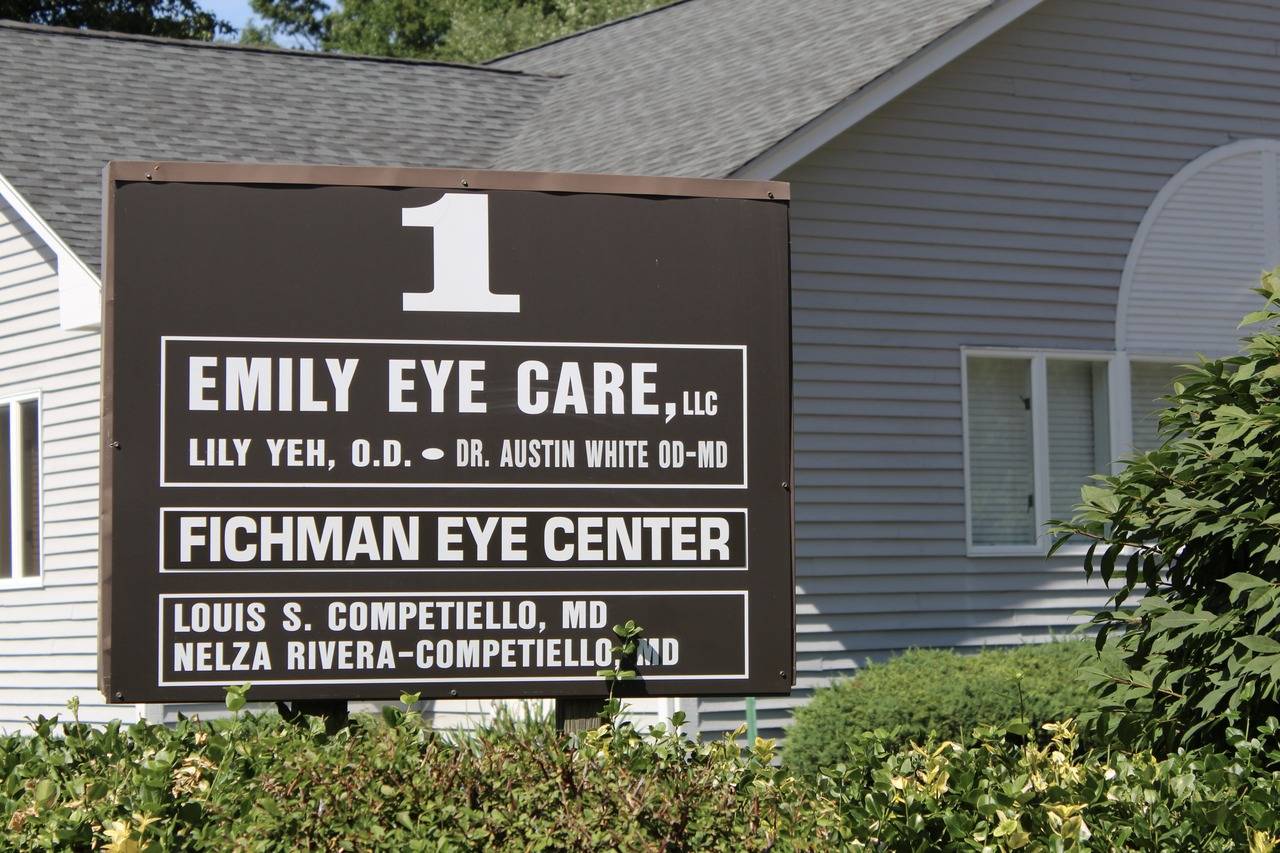 Eye Doctor Showing Eyeglasses
