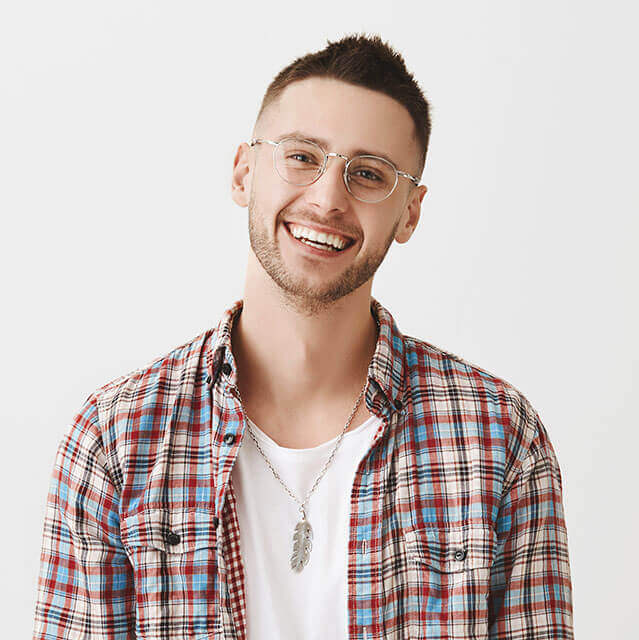 Cute Ordinary Caucasian Trendy Guy In Glasses Smiling Cheerfully