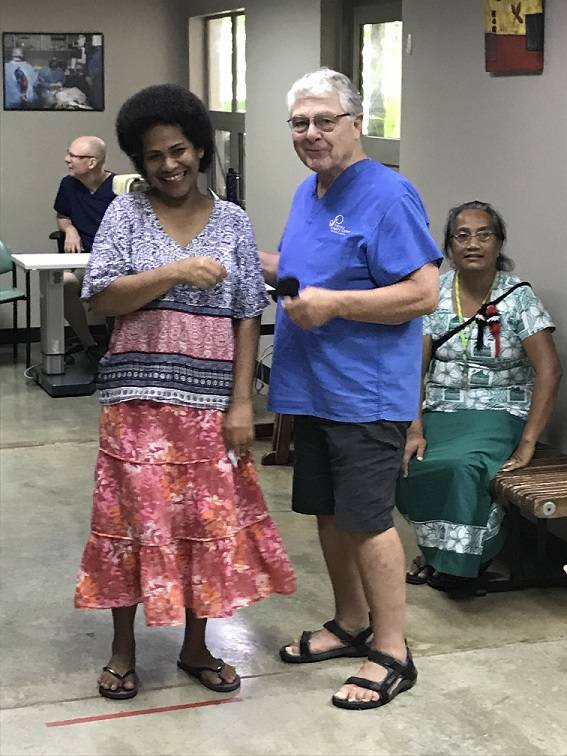 Optometrist and patients in Fiji