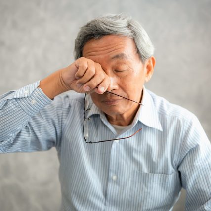 senior man suffering from dry eye