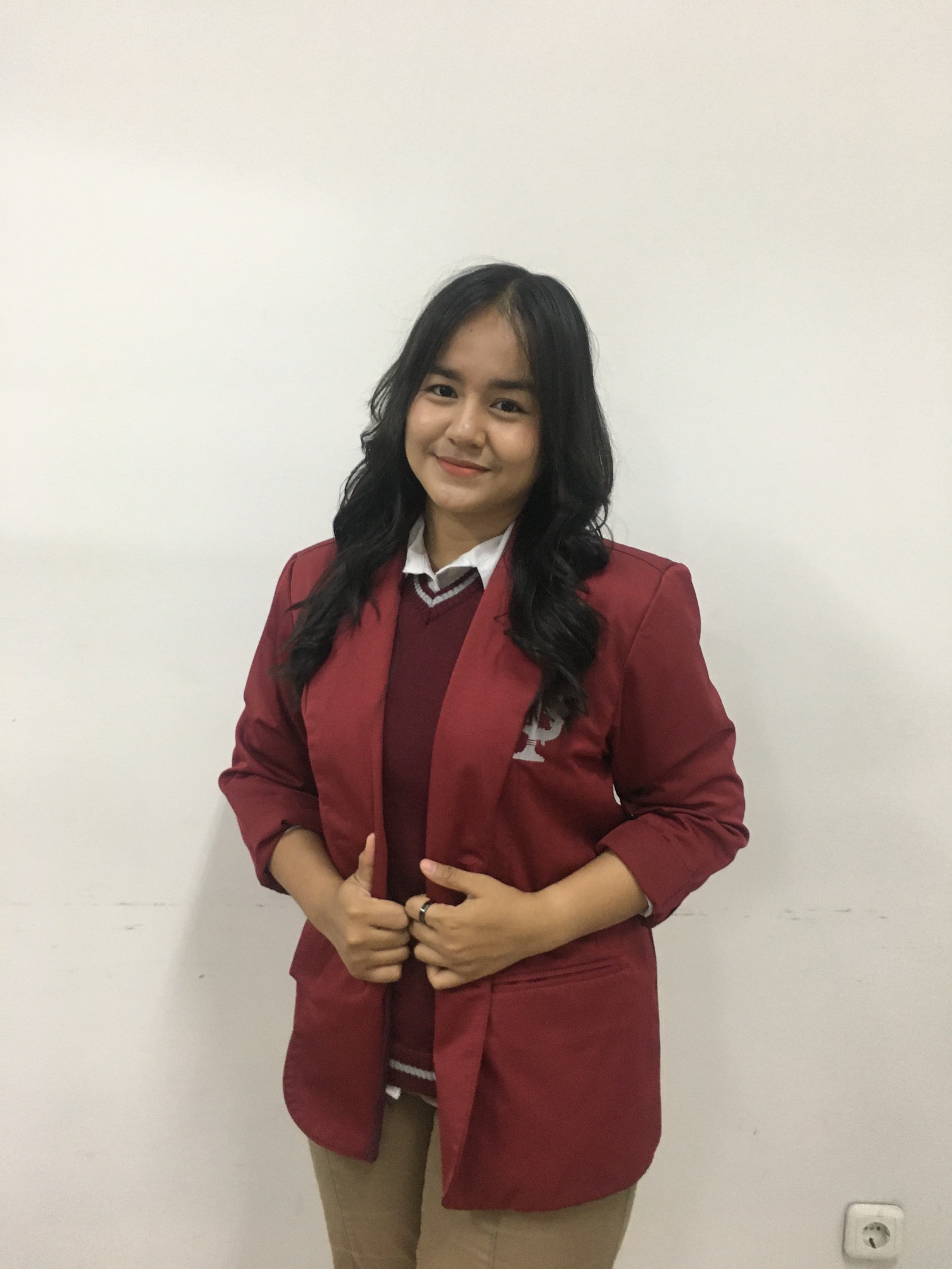 Thesion Marta Sianipar