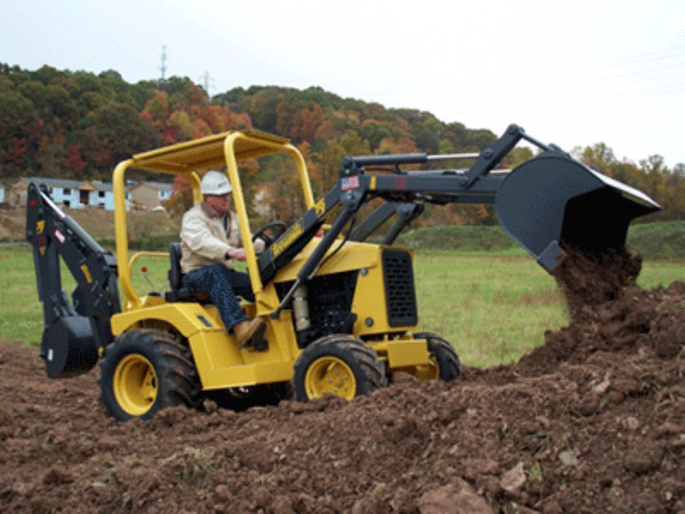 Terramite T9 Compact TLB Muscles Into Tight Spots Story ID 9091