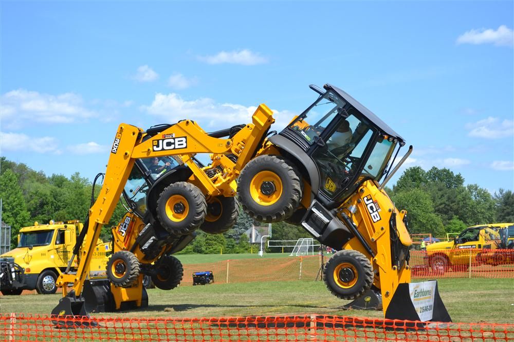 JCB ’Dancing Diggers’ Put on a Show at Horsham Day Story ID 23007