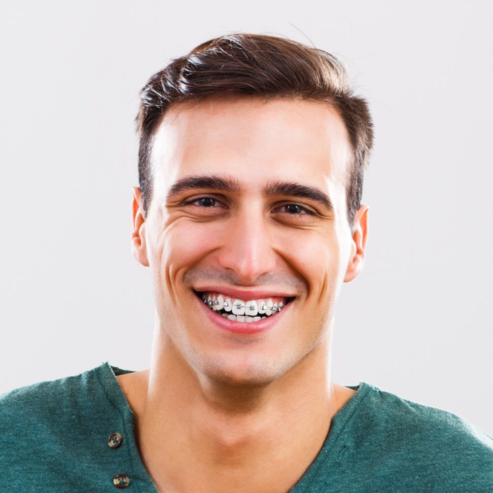 Young man wearing metal braces