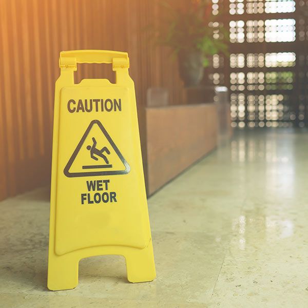 Caution sign on wet floor