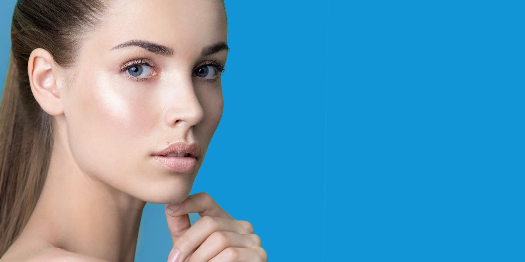 Beautiful woman touching chin