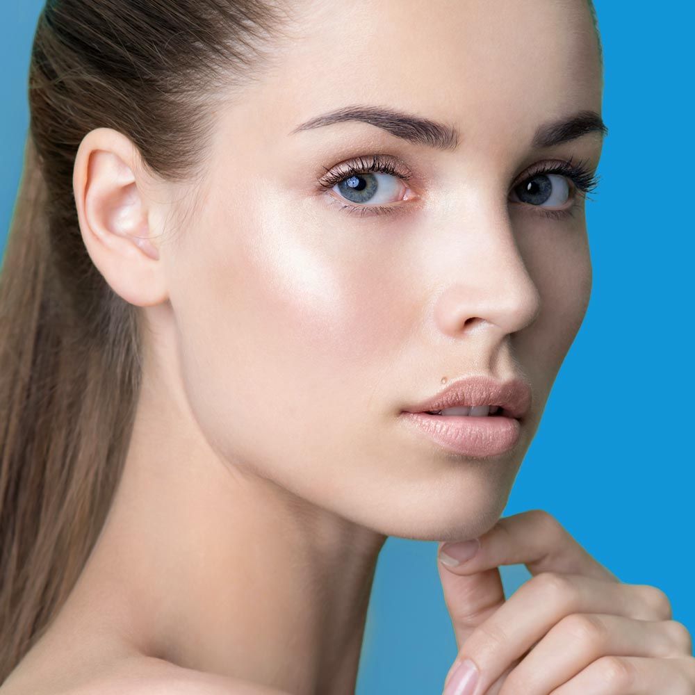 Beautiful woman touching chin