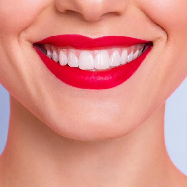 Woman's chin and bright red lips