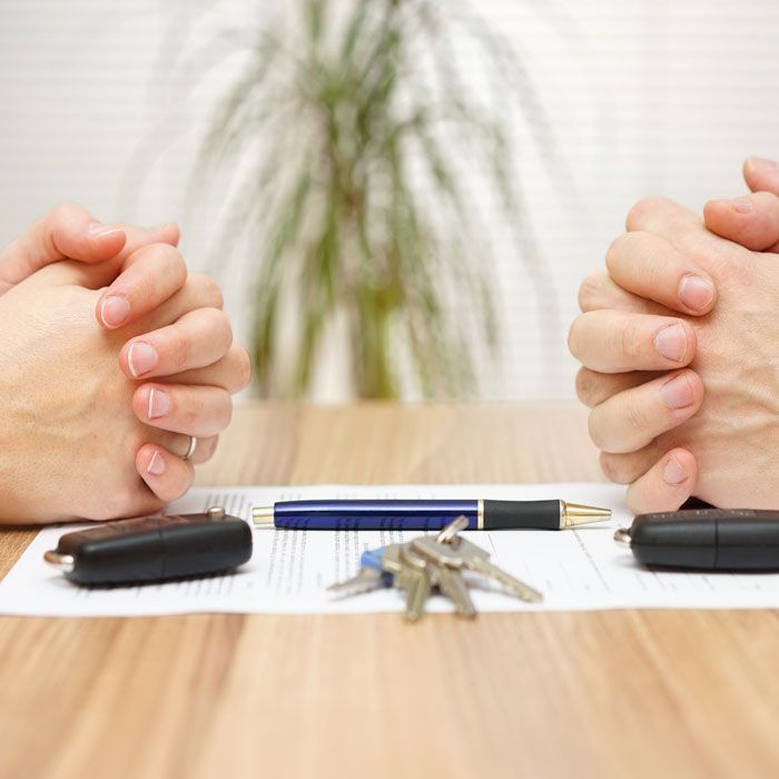 Couple with property division paperwork