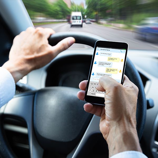 Driver texting on phone